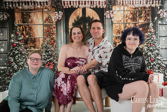 Family photographed with Santa in Bunbury Photography Studio