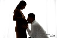 Silhouette photo of a pregnant mum and dad to be