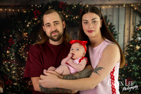 Family enjoying a Christmas mini session with Santa in a styled festive studio in Bunbury Western Australia