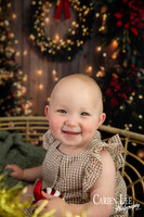 Family enjoying a Christmas mini session with Santa in a styled festive studio in Bunbury Western Australia