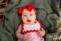 Family enjoying a Christmas mini session with Santa in a styled festive studio in Bunbury Western Australia