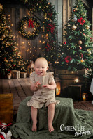 Family enjoying a Christmas mini session with Santa in a styled festive studio in Bunbury Western Australia