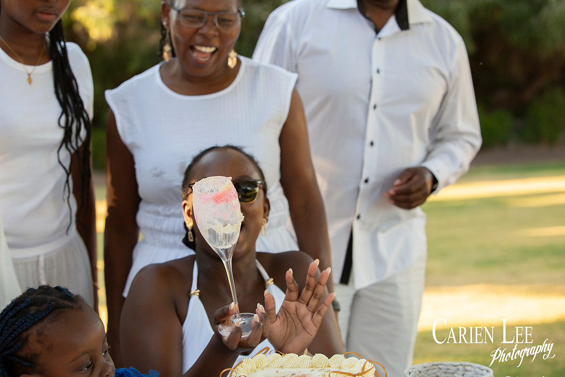 Family celebrating a gender reveal moment outdoors in Dalyellup Western Australia