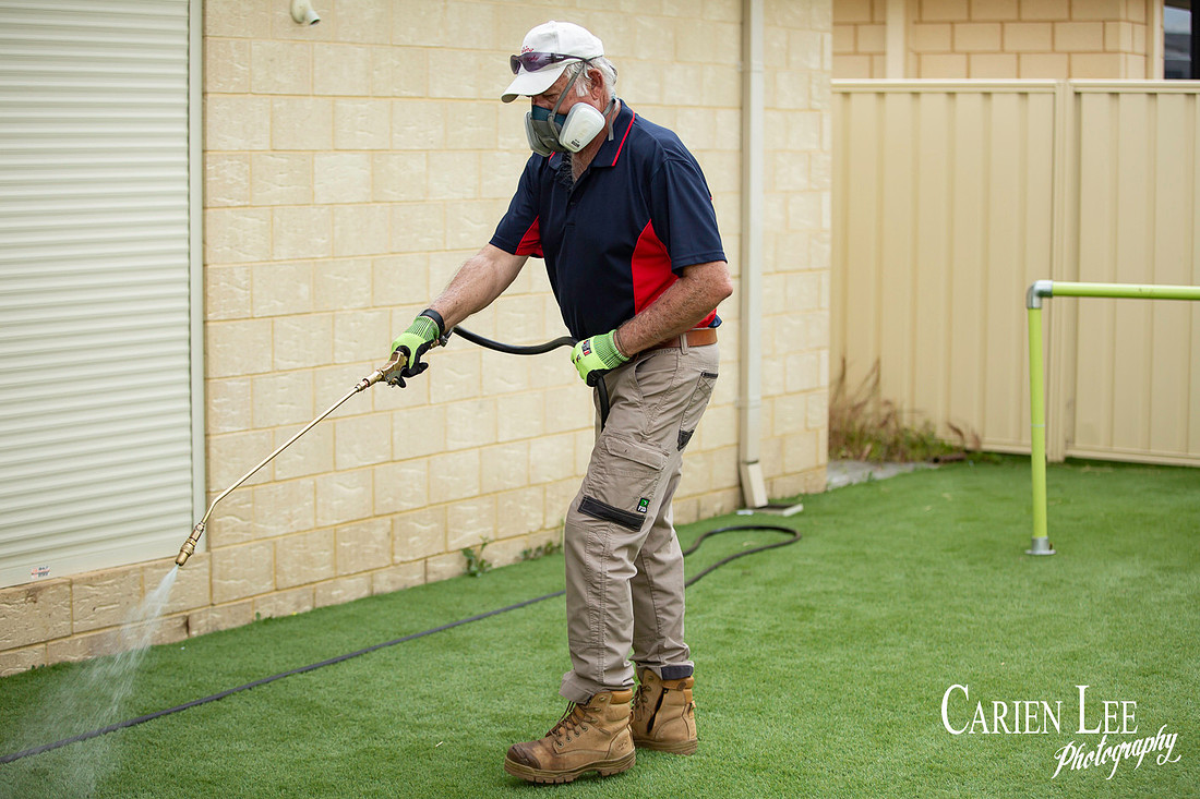 Technician captured during a branding shoot for pest control services in Mandurah Western Australia