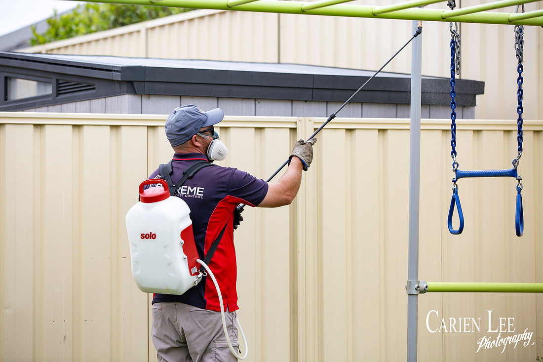 Technician captured during a branding shoot for pest control services in Mandurah Western Australia