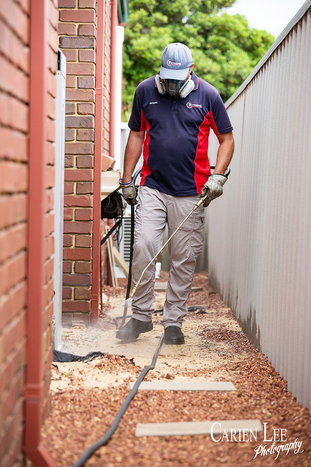 Technician captured during a branding shoot for pest control services in Mandurah Western Australia