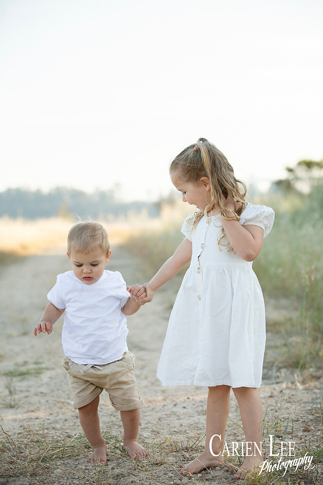 Family interacting naturally during a lifestyle photography session in Bunbury