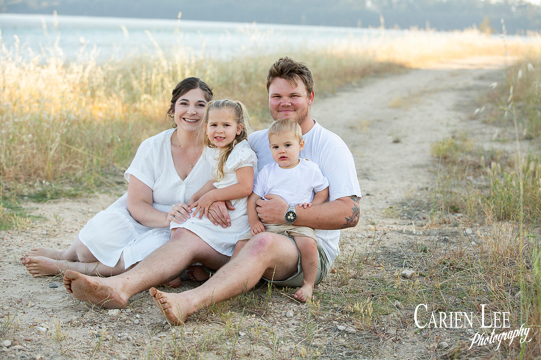 Family interacting naturally during a lifestyle photography session in Bunbury