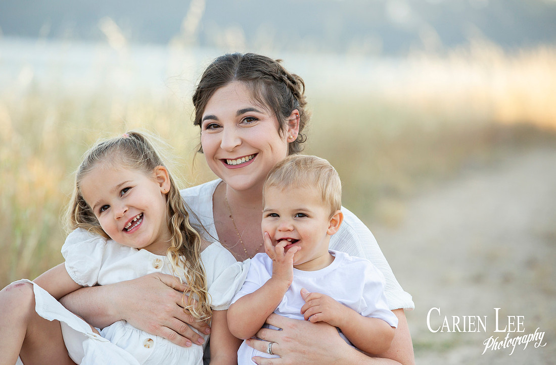 Family interacting naturally during a lifestyle photography session in Bunbury