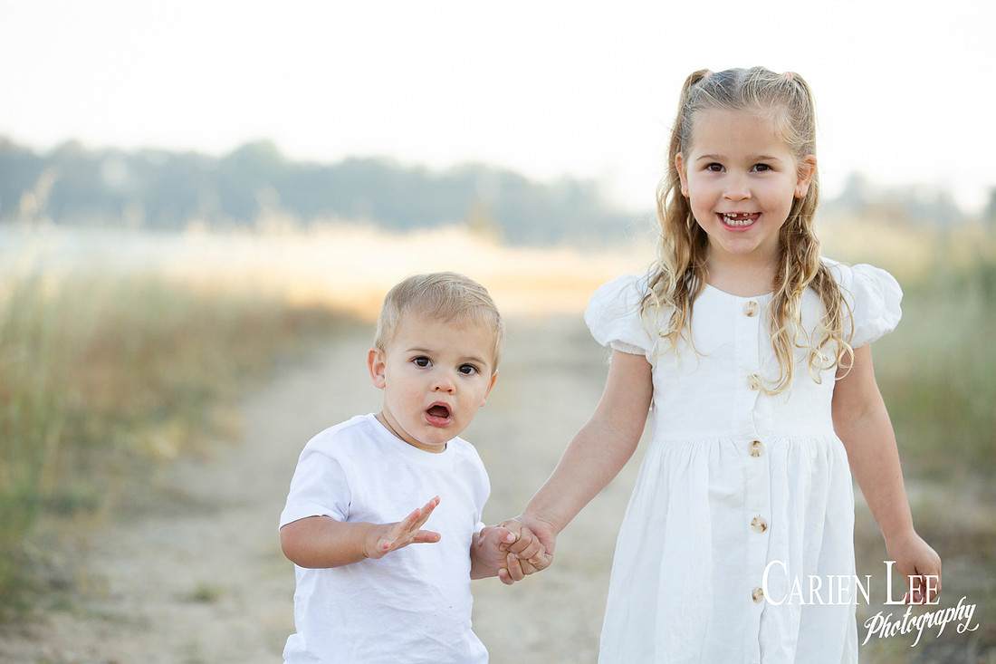 Family interacting naturally during a lifestyle photography session in Bunbury