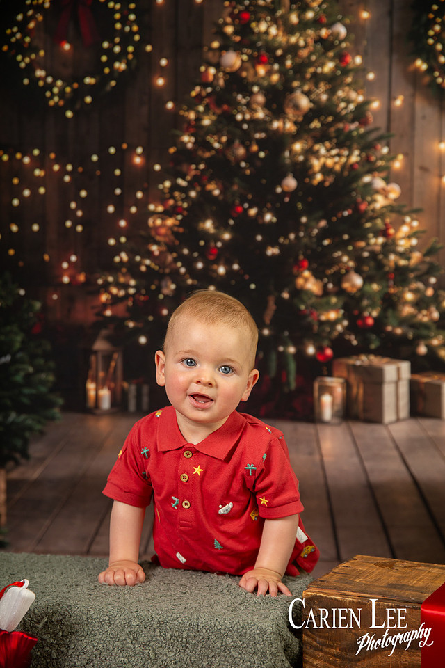 Festive Christmas photo of child with Santa Bunbury