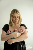 Newborn baby wrapped in soft blankets during Bunbury newborn photography session