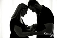 Newborn baby wrapped in soft blankets during Bunbury newborn photography session