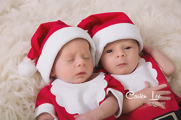 Twin baby boys posed together during newborn photography session
