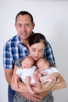 Lifestyle newborn photography with twin babies and family