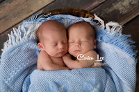 Twin baby boys posed together during newborn photography session