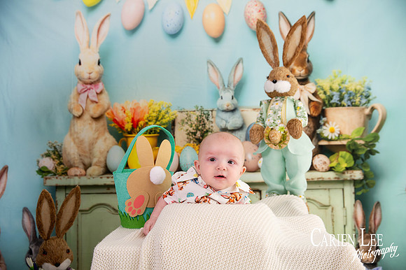 smiling baby in easter setup in bunbury photography studio