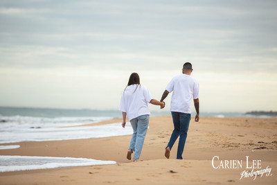 Photo of an engaged couple on Bunbury Back Beach