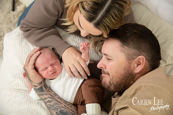 New parents and baby during a mothers day session in bunbury