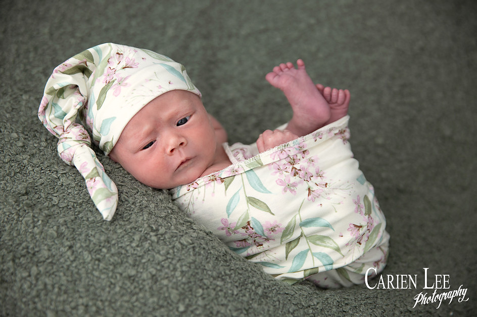 Newborn Girl posing herself during a newborn session