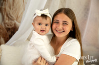 photo of young and older sibling during mothers day photo session in bunbury