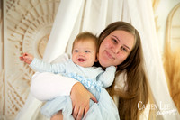Family portrait of parents with their one-year-old daughter in Bunbury photography studio