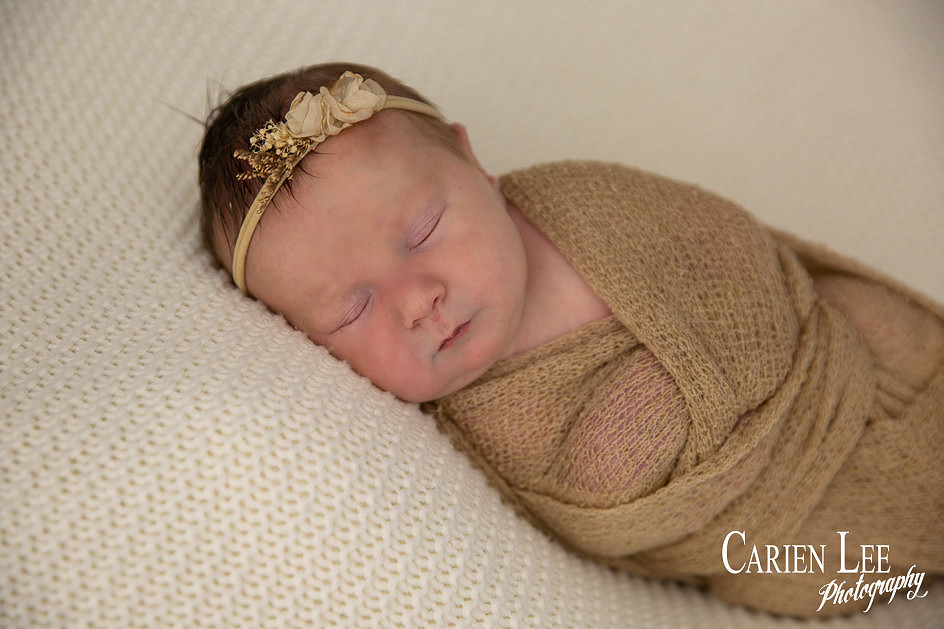 Baby girl newborn wrapped up in studio in Bunbury