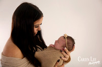 hoto of a new mum and her daughter in Bunbury photography studio