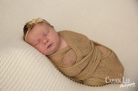 Baby girl newborn wrapped up in studio in Bunbury