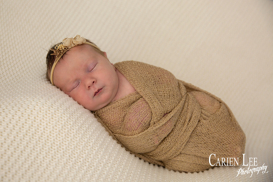 Baby girl newborn wrapped up in studio in Bunbury