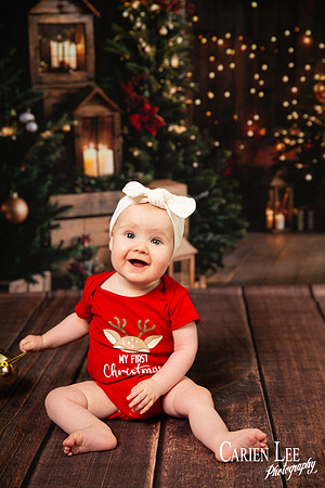 Child smiling with Santa during Bunbury Christmas mini session