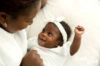 Photo of a young mother and her 4 month old daughter