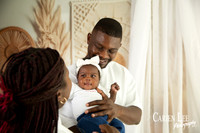 Young mother and father with their first baby during a family session in Bunbury
