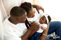 Parents adoring their first born baby during a photo shoot in Bunbury
