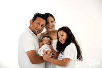 Family photo with parents and sibling during a newborn family session in Bunbury