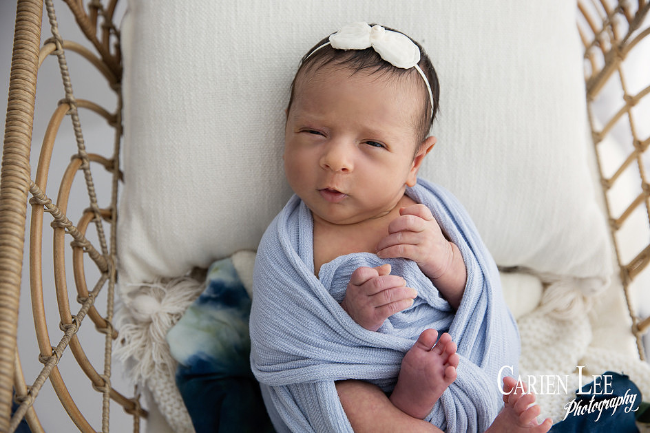 Photo of a baby wrapped in stretchy wrap in Bunbury photo shoot