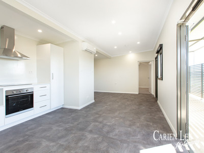 Open plan living area of 2 bedroom 2 bathroom unit in Australind