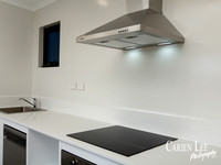 Close up photo of a kitchen hob and extractor fan in a unit in Australind