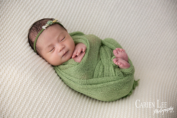 Galvez family newborn photography session in Bunbury featuring parents, newborn baby girl and family puppy captured by a professional Bunbury newborn photographer.