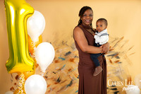 1 year old baby boy during a photo shoot with his mother