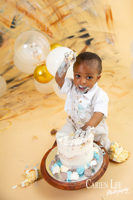 1 year old boy smashing his cake during a dalyellup cake smash session