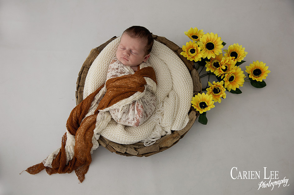 4 week old baby photographed during a newborn photography session in Bunbury by Carien Lee Photography.