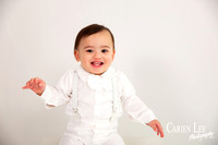 Elijah and his mum sharing a loving moment during a first birthday photography session