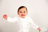 Elijah and his mum sharing a loving moment during a first birthday photography session