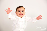 Elijah and his mum sharing a loving moment during a first birthday photography session