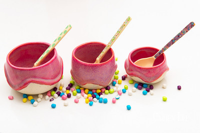 Commercial product photography highlighting handcrafted pottery in natural tones.