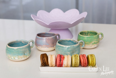 Commercial product photography highlighting handcrafted pottery in natural tones.