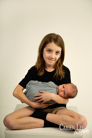 Newborn baby Luca sleeping in wrap, Bunbury newborn photography