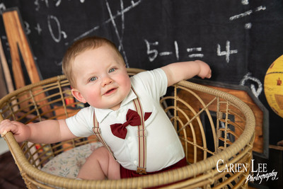 Candid laugh captured during baby milestone photography session in Bunbury
