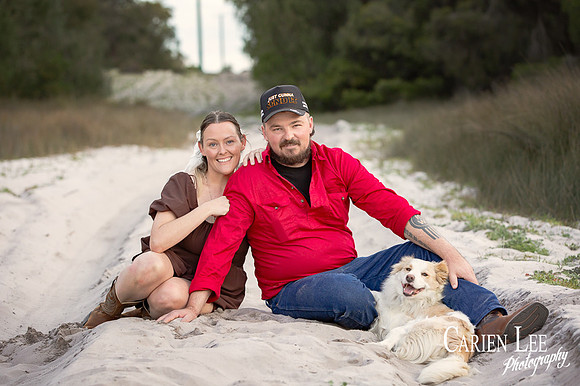 Candid laugh between couple and their dog during Bunbury engagement session